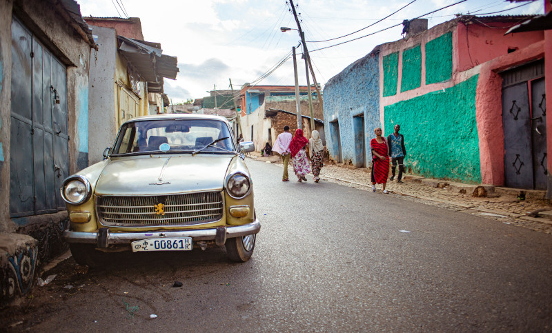 A 70-year-old car is parked on a dirt road in Harar, Ethiopia