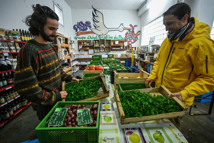 Two men in a grocery store